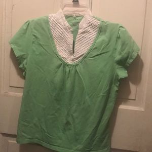 Green junior’s top